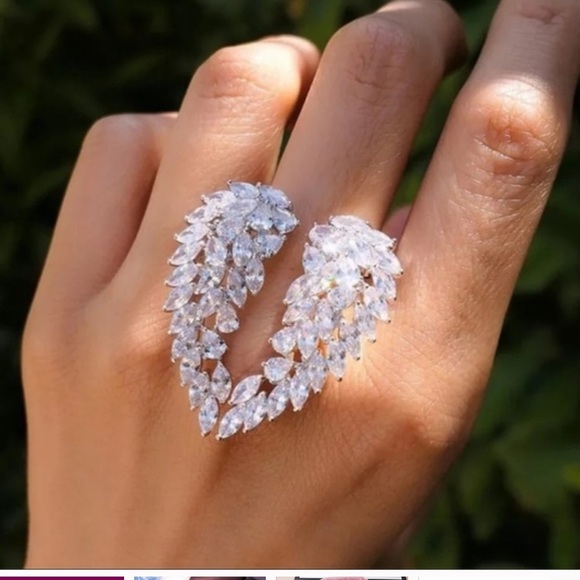 925 silver ANGEL WINGS opening adjustable ring Marquis CZs
NWOT - Picture 1 of 7